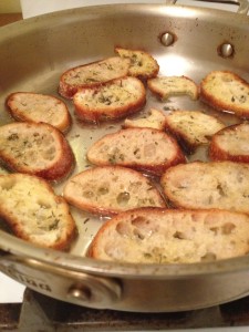 toasted bread rounds in olive oil and herbs | stems and all