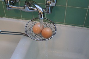 cool eggs in water for perfect soft boiled eggs