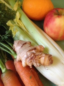 Juicer juice recipe with apple, celery, carrots, and ginger