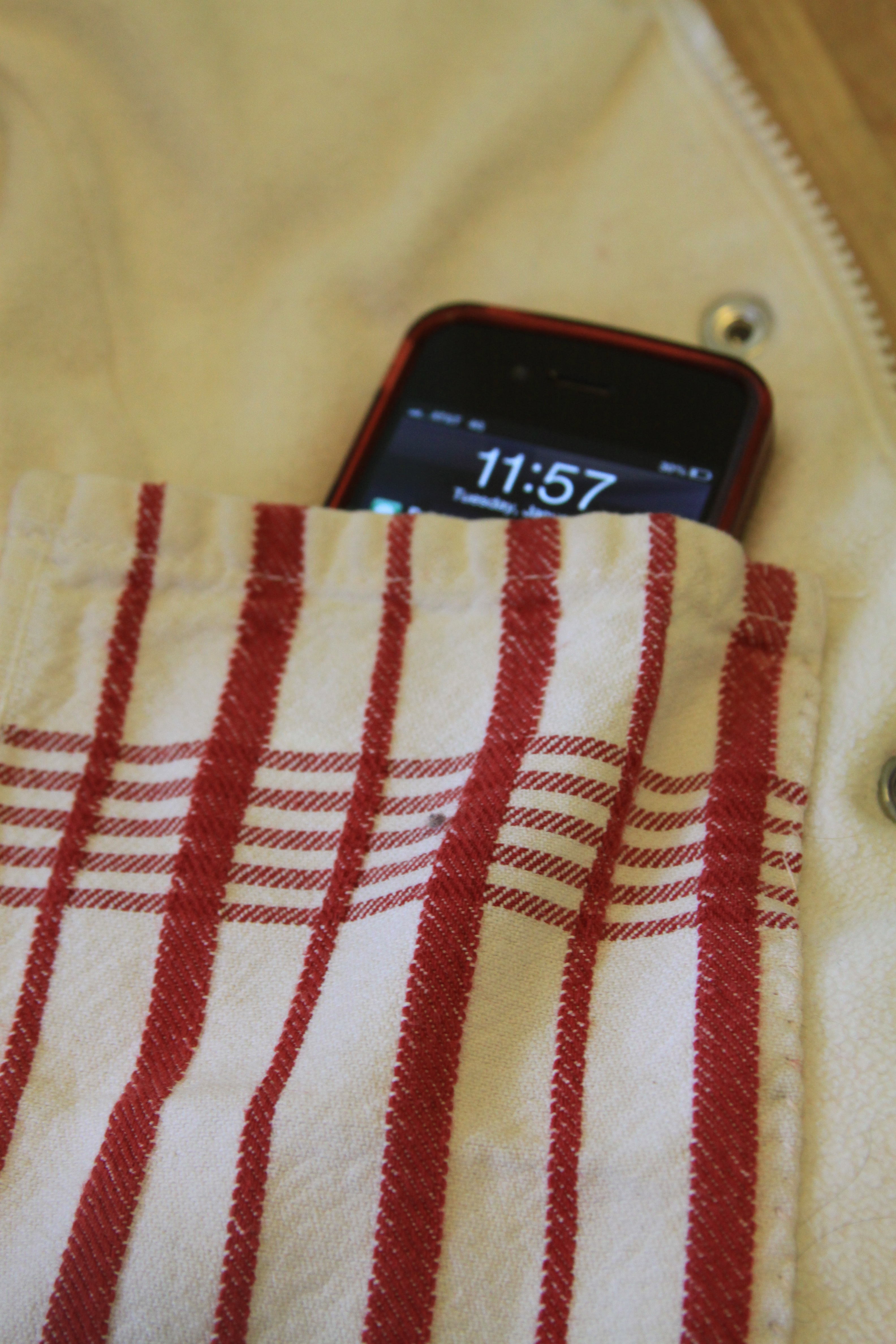 new pocket sewn into lining of vest.
